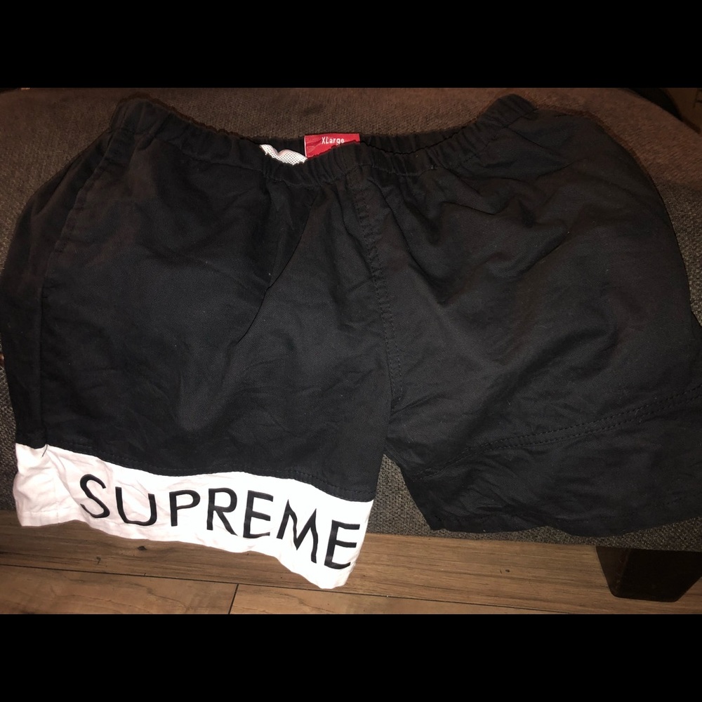 Black and white XL Supreme swim shorts